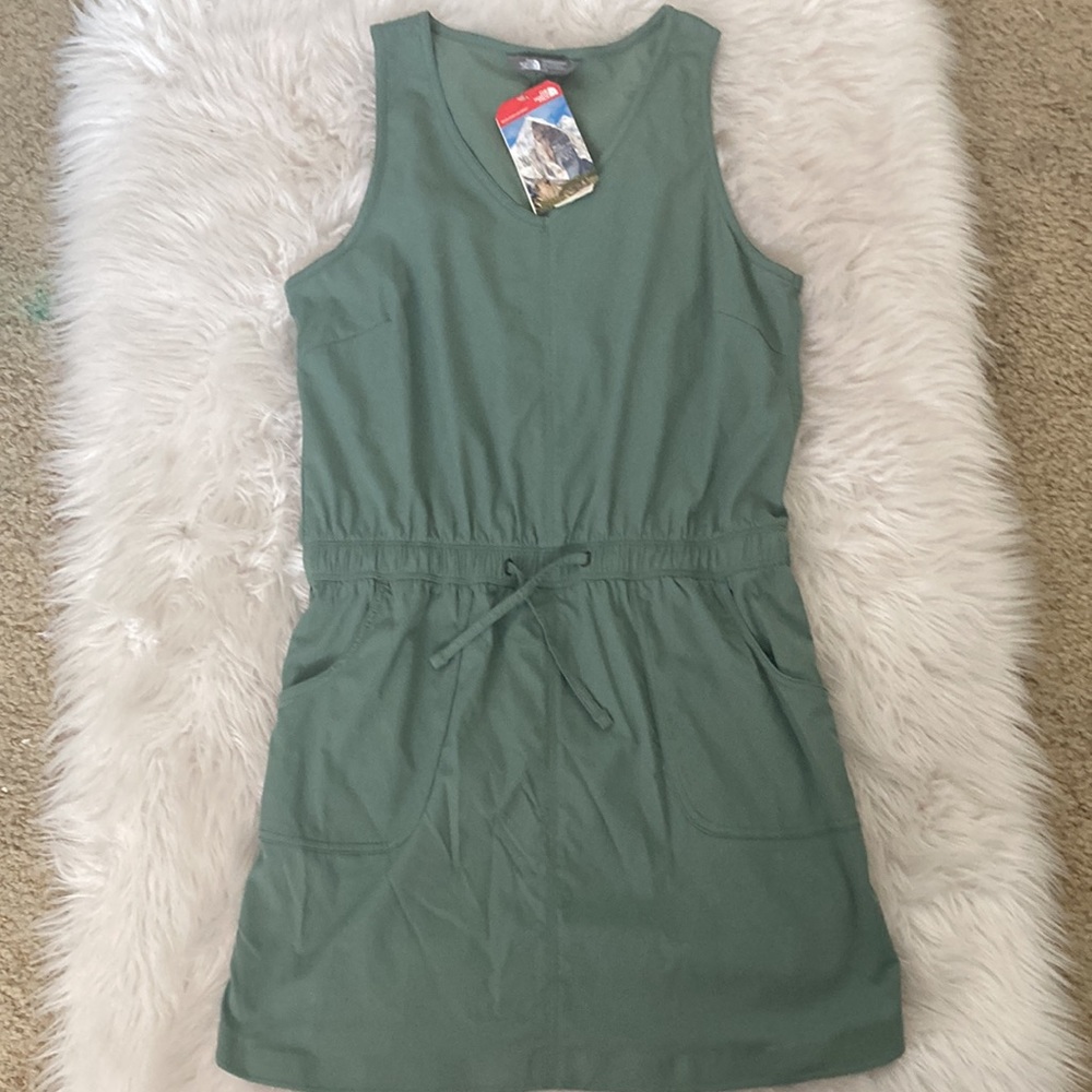 Super cute sage green summer romper from The North Face. NWT. Size Large.